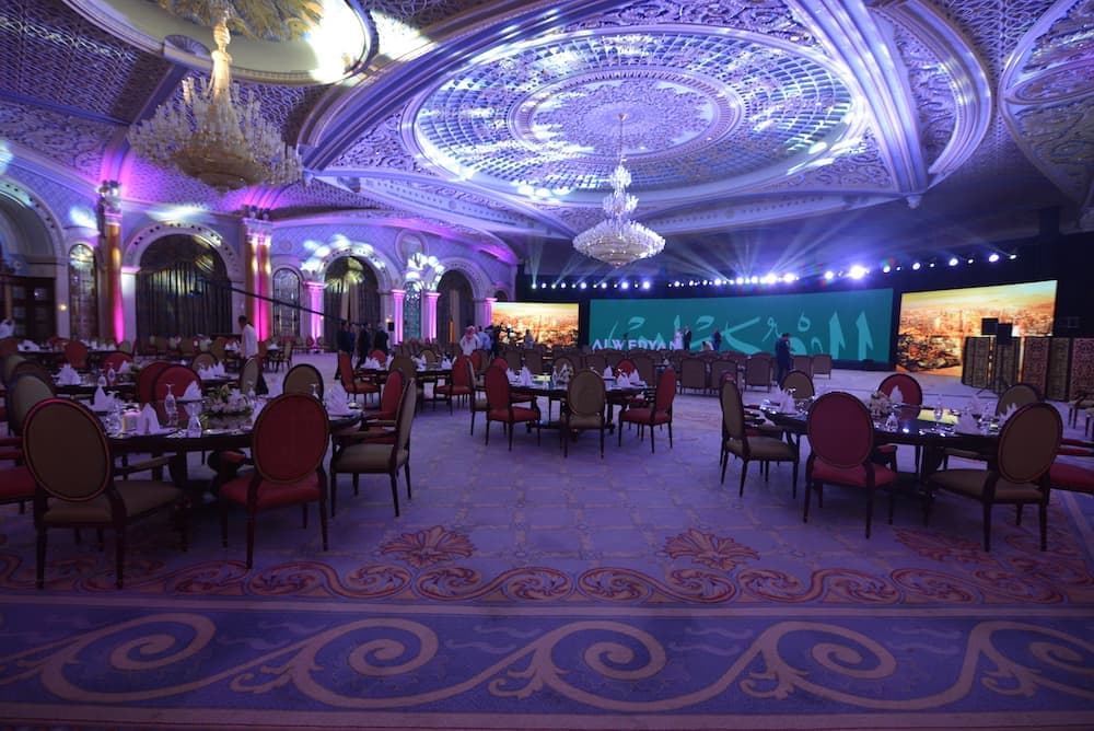 Grand banquet hall with red seating