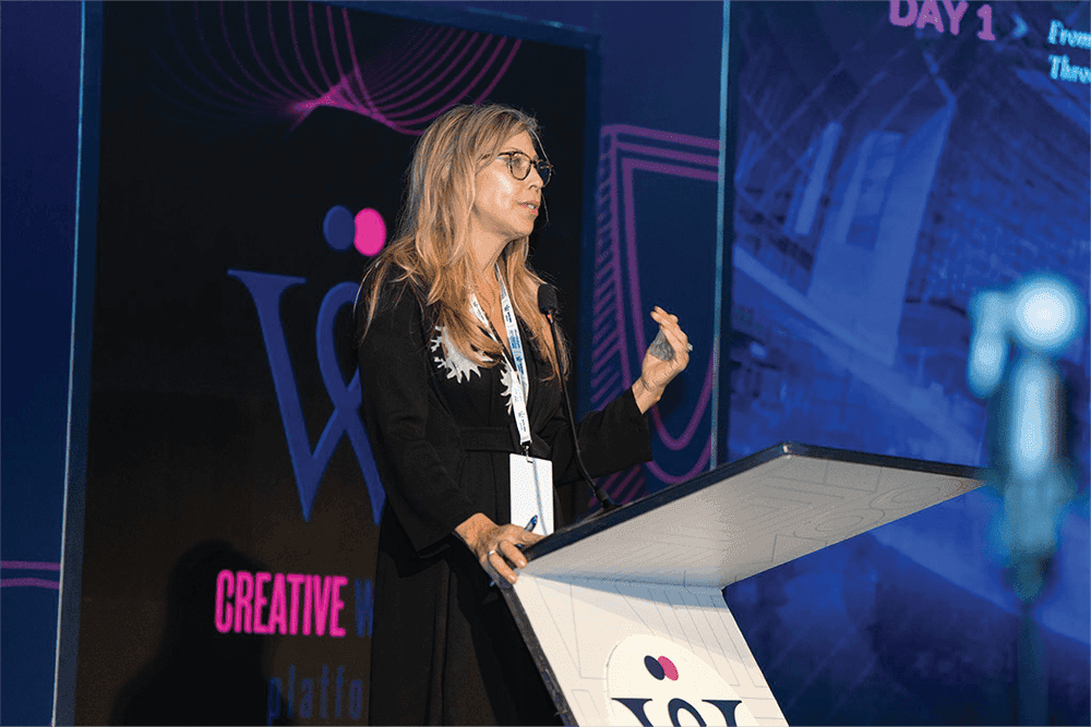 Creative Women Forum 2025, fireside on stage, main LED branding, group photo with audience
